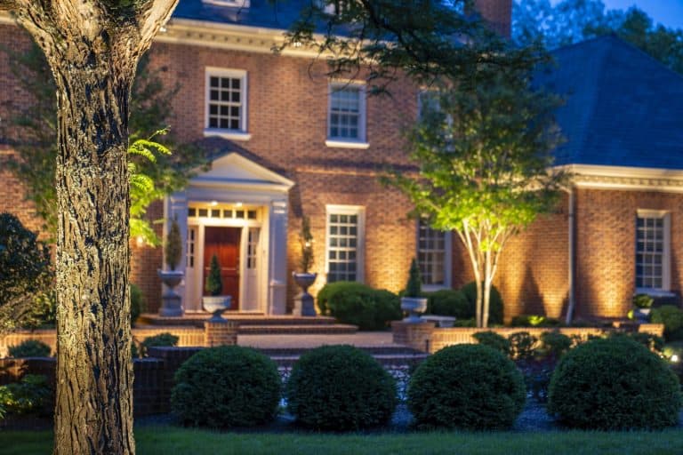 Facade and tree lighting on a brick colonial McLean, VA home