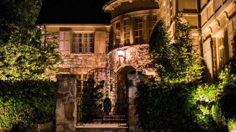 Grazing light on the stone and stucco entry of a McLean, VA home